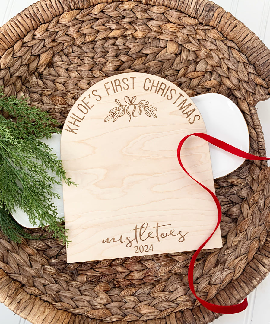 First Christmas mistletoes footprint board